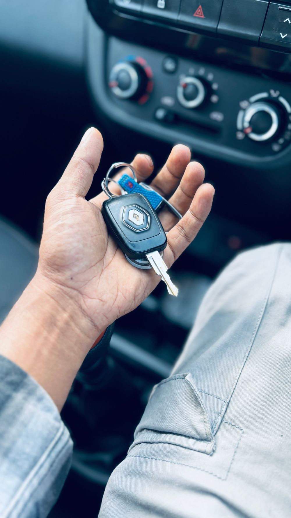 Driver holding car keys, ready to get back on the road with new coverage
