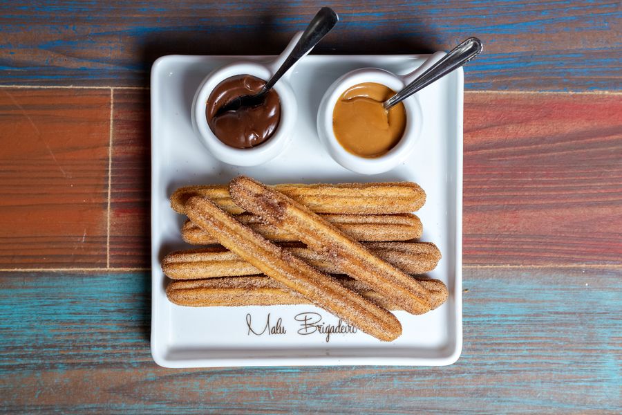 Churros with chocolate and caramel dips