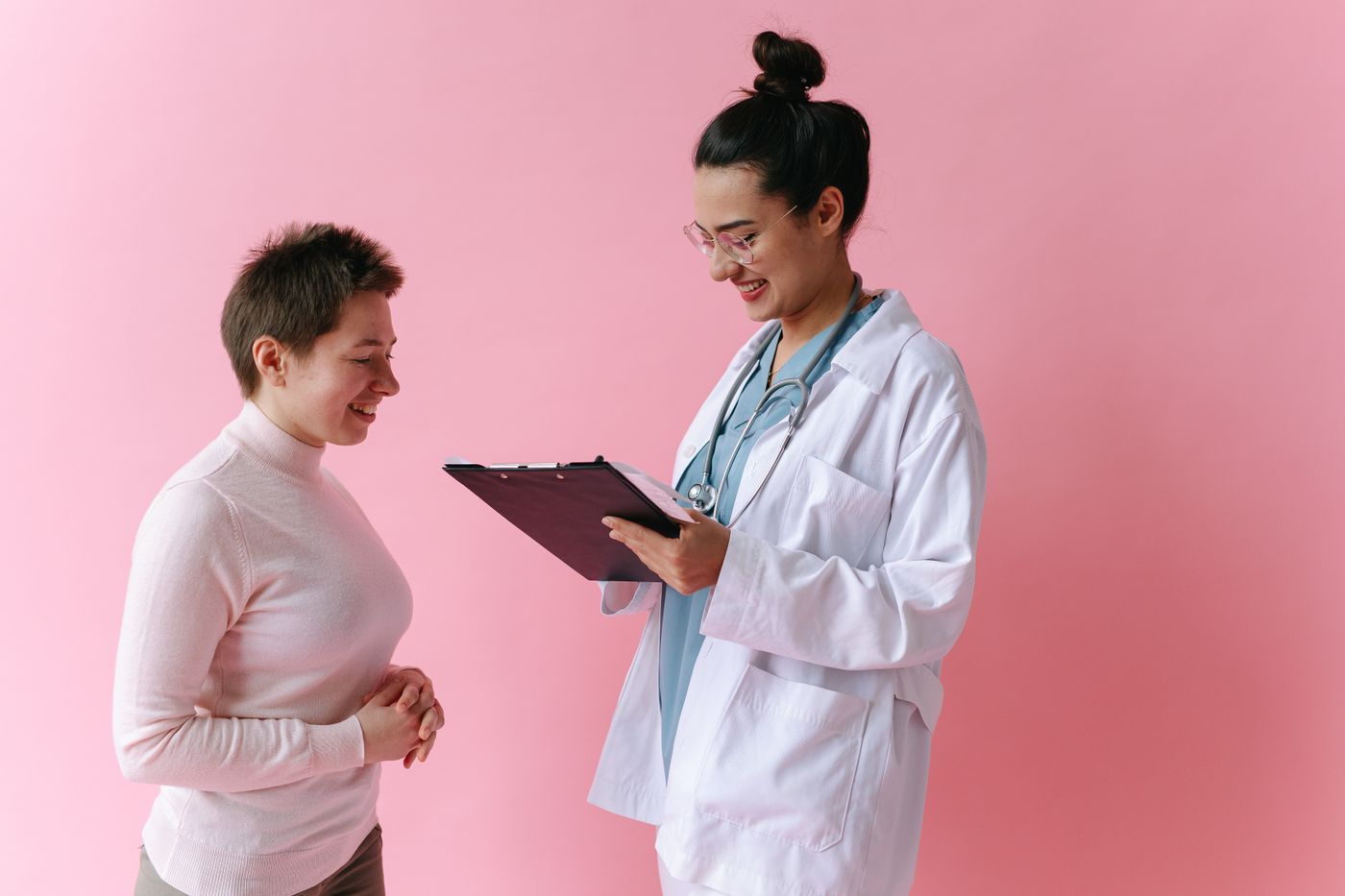A Meridian doctor talking with a patient during a visit