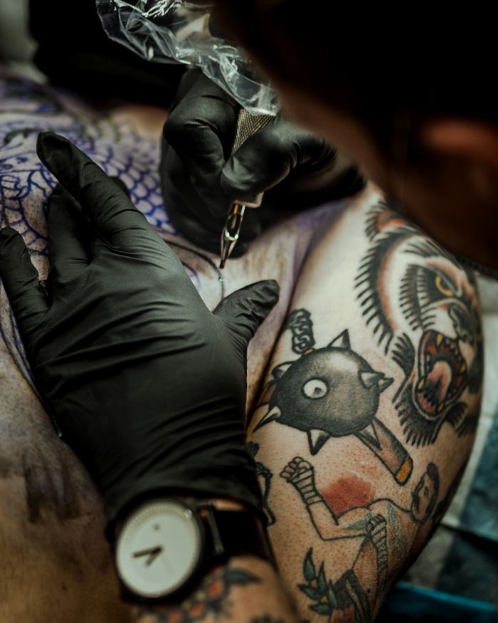 Client getting a tattoo