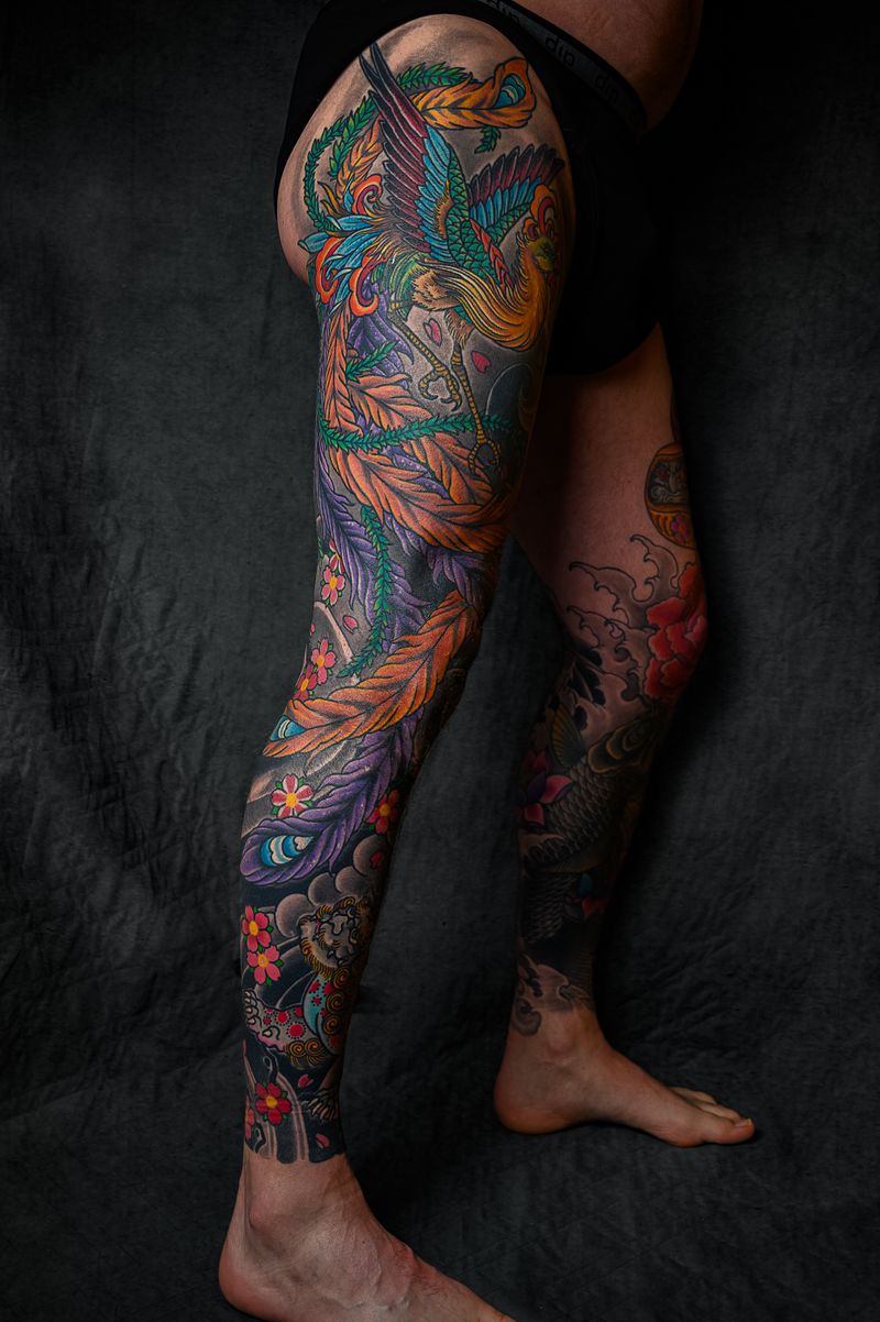Person with a floral leg tattoo
