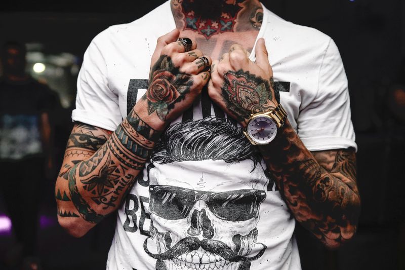 Hands with detailed tattoos